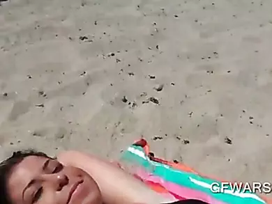 Teen cutie in swim suit flashing off colour butt before beach